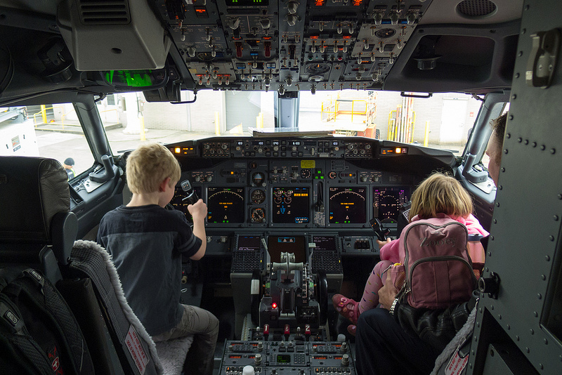 kids flying airplane